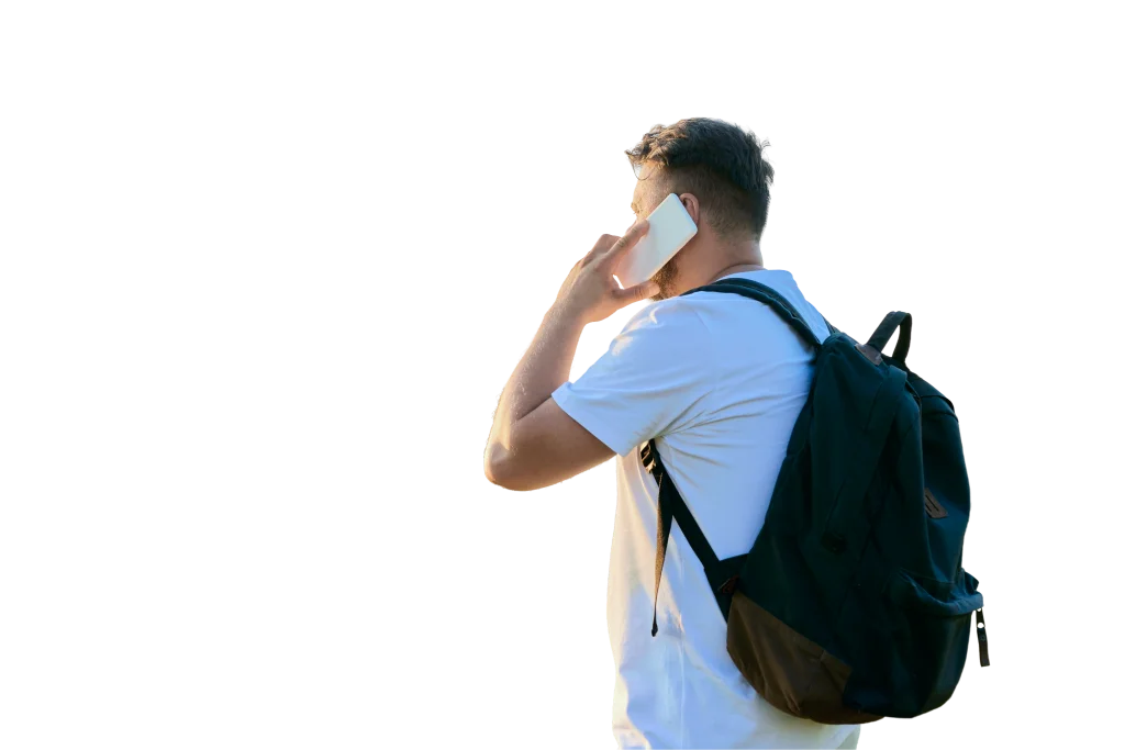 Man talking on a mobile phone outdoors